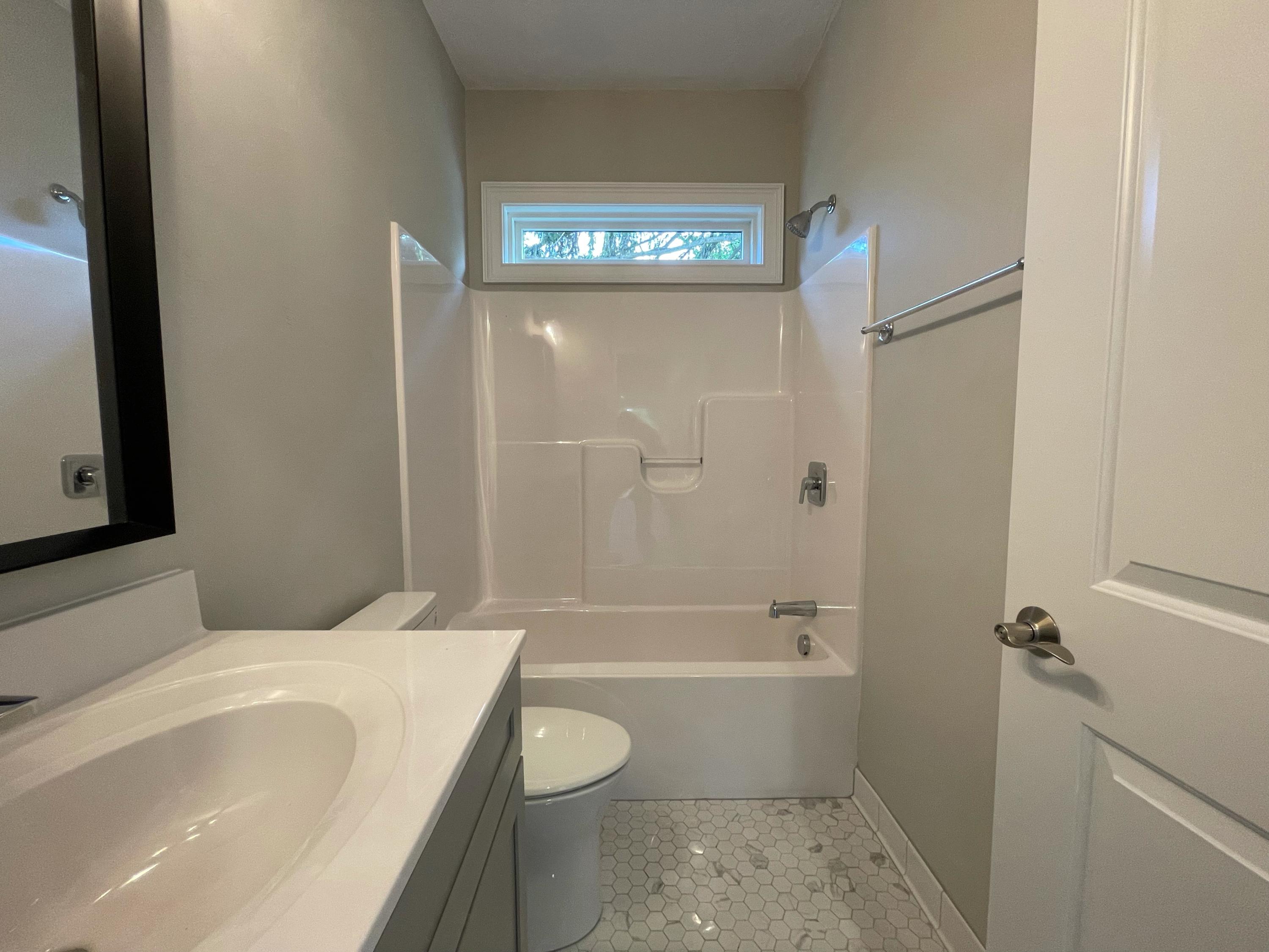 1675 Mountain View Road Vinton, VA 24179 - Photo 22 of 31 a bathroom with a toilet and a bathtub