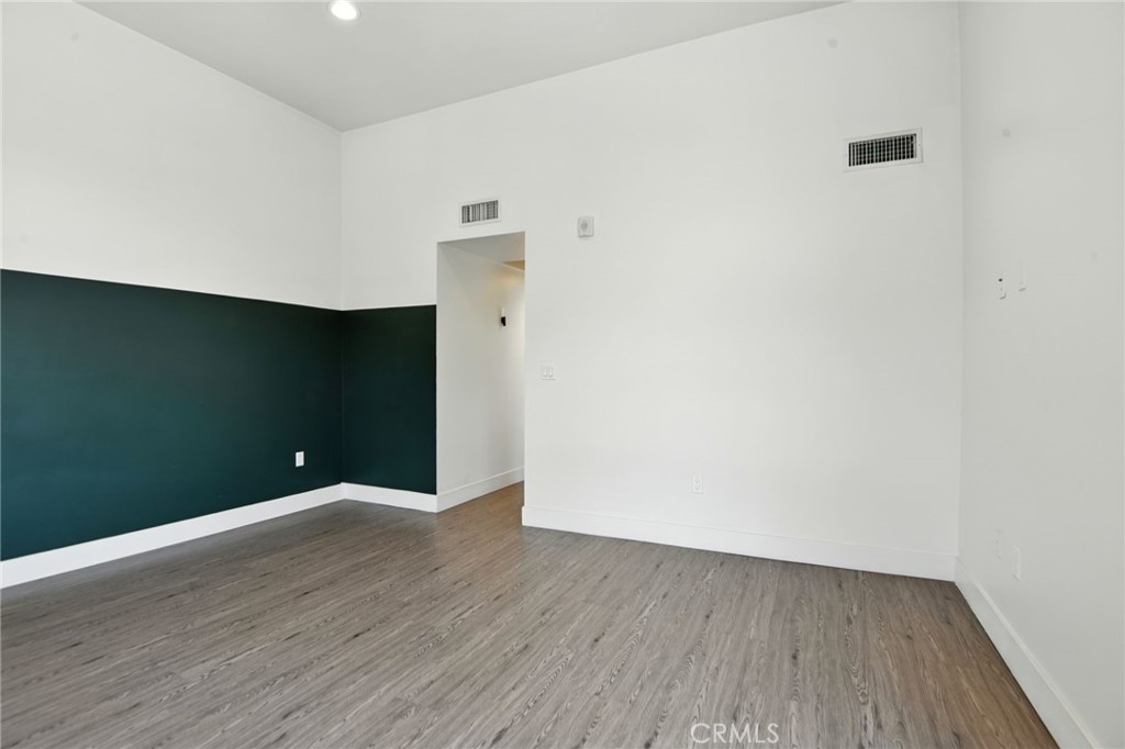 4461 Tujunga Avenue, Unit 101 Studio City, CA 91602 - Photo 24 of 34 a view of an empty room with wooden floor