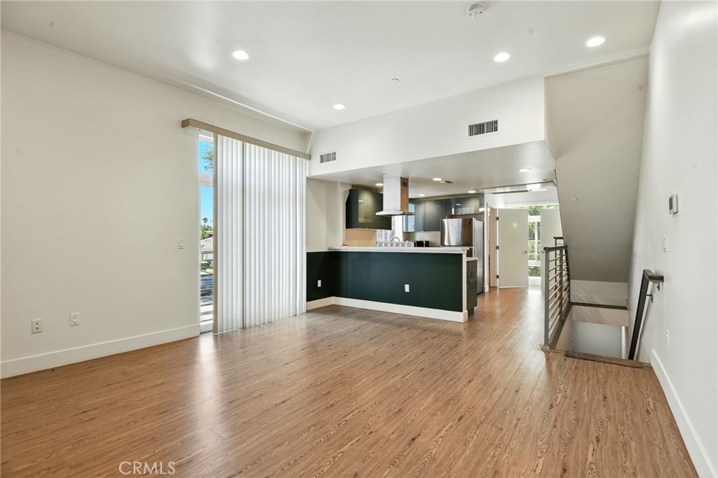 4461 Tujunga Avenue, Unit 101 Studio City, CA 91602 - Photo 9 of 34 a view of kitchen with wooden floor