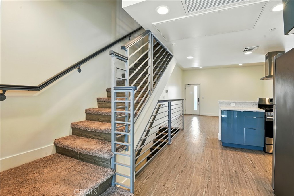 4461 Tujunga Avenue, Unit 101 Studio City, CA 91602 - Photo 10 of 34 a view of entryway and hall with wooden floor