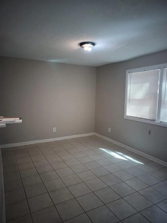 3405 Cobbs Ferry Drive, Unit 3405 Decatur, GA 30032 - Photo 3 of 9 a view of an empty room and a window