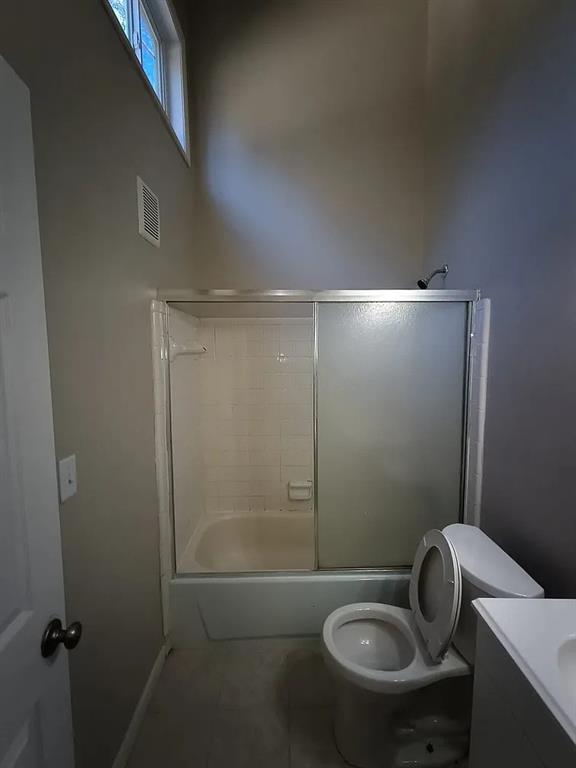 3405 Cobbs Ferry Drive, Unit 3405 Decatur, GA 30032 - Photo 8 of 9 a bathroom with a toilet and a shower