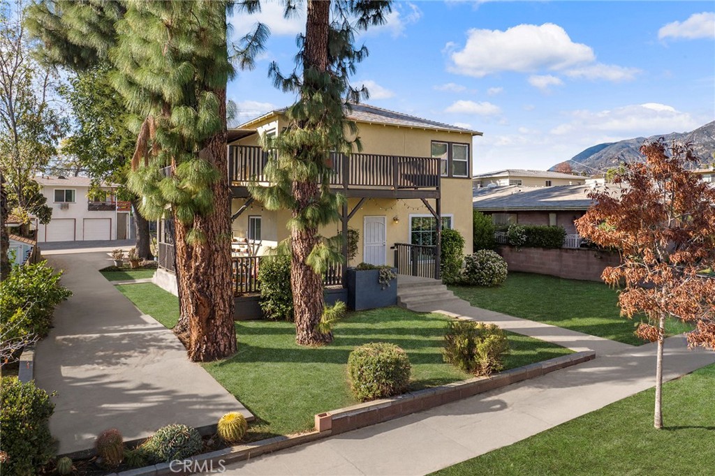 1255 Del Rey Avenue Pasadena, CA 91107 - Photo 2 of 3 a view of house with yard in front of it