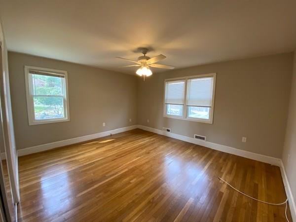 490 Rocky Hill Road Scituate, RI 02857 - Photo 21 of 33 wooden floor in an empty room with a window