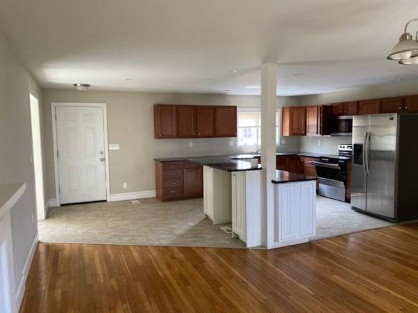 490 Rocky Hill Road Scituate, RI 02857 - Photo 4 of 33 a view of kitchen with wooden floor