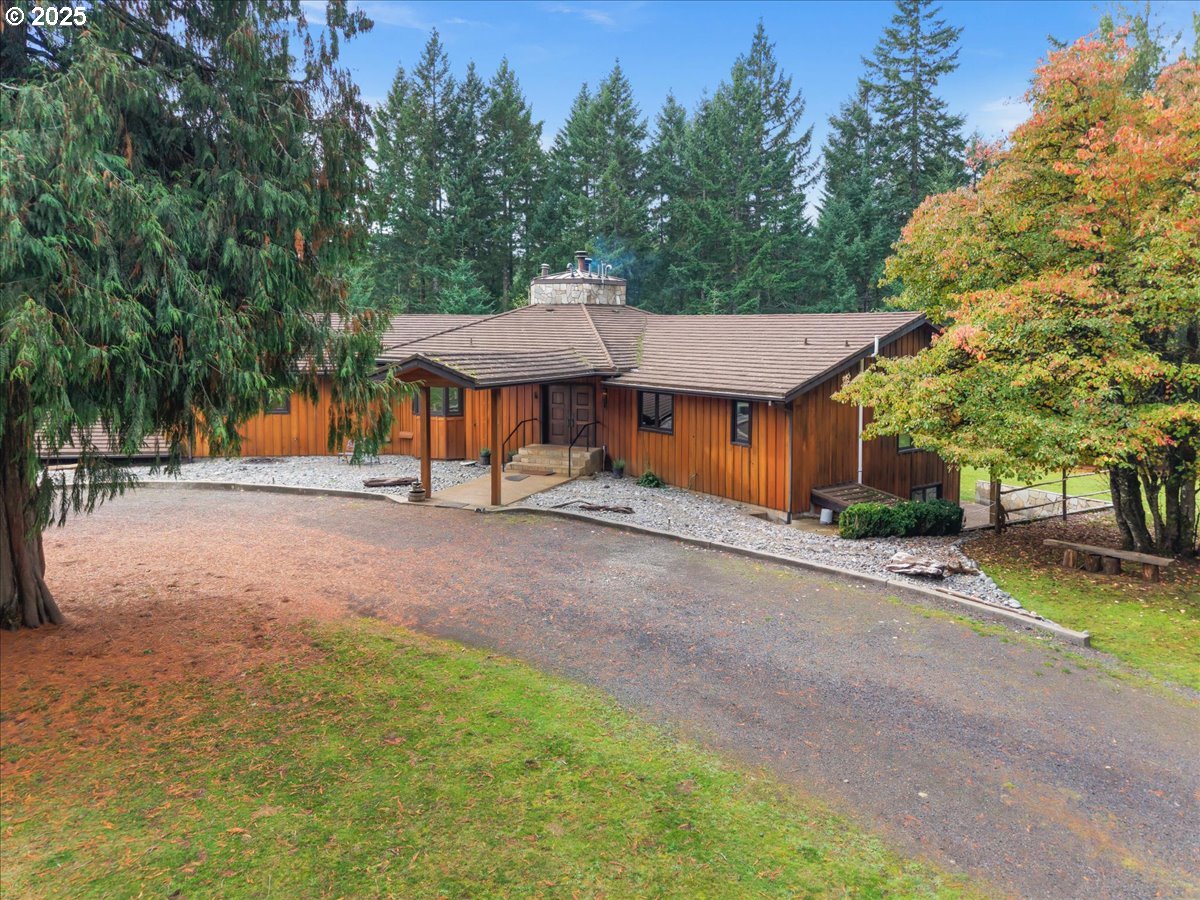 51720 Northwest Hayward Road Manning, OR 97125 - Photo 2 of 48 a view of a house with backyard and trees