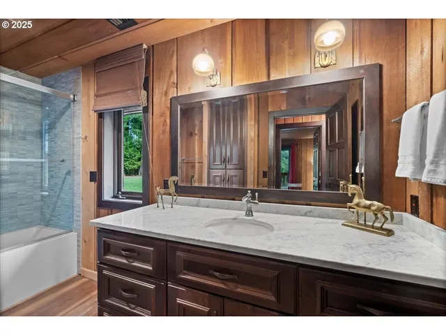 a swimming pool with outdoor seating and yard