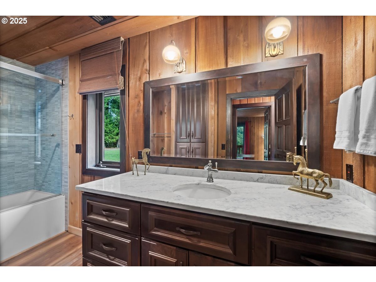 51720 Northwest Hayward Road Manning, OR 97125 - Photo 24 of 48 a bathroom with a sink and a mirror