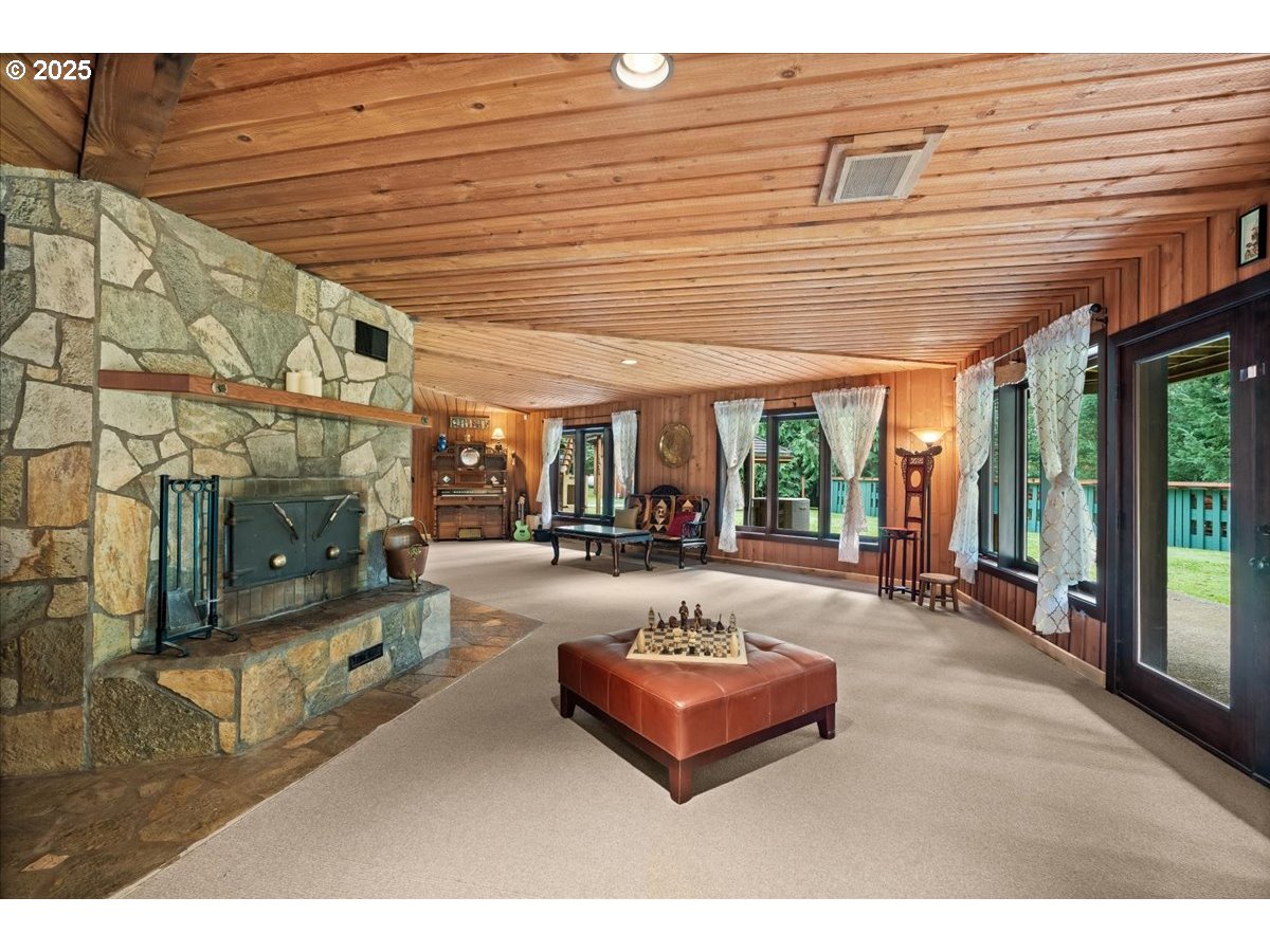 51720 Northwest Hayward Road Manning, OR 97125 - Photo 26 of 48 a swimming pool with outdoor seating and yard