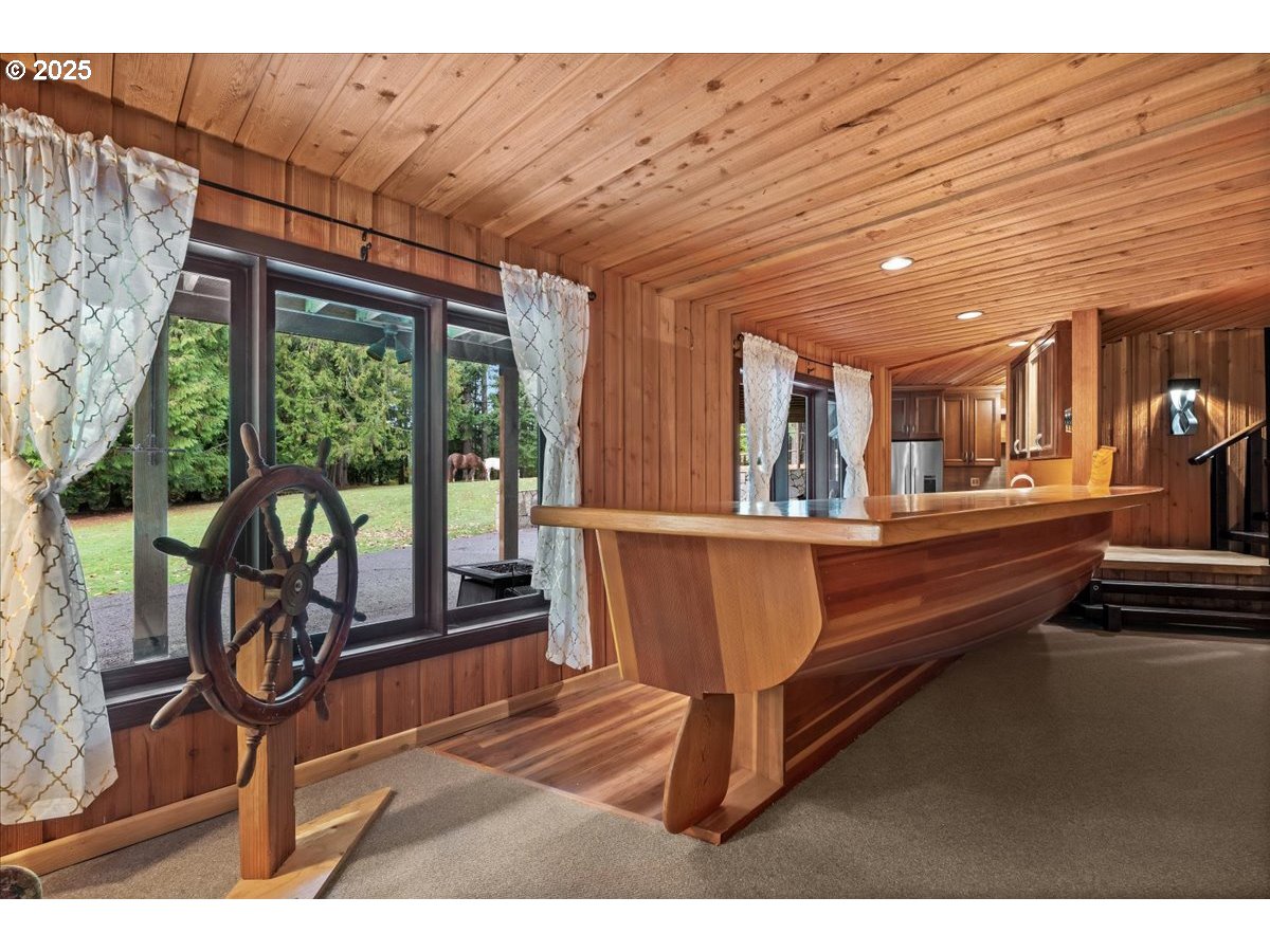 51720 Northwest Hayward Road Manning, OR 97125 - Photo 28 of 48 a living room with large windows