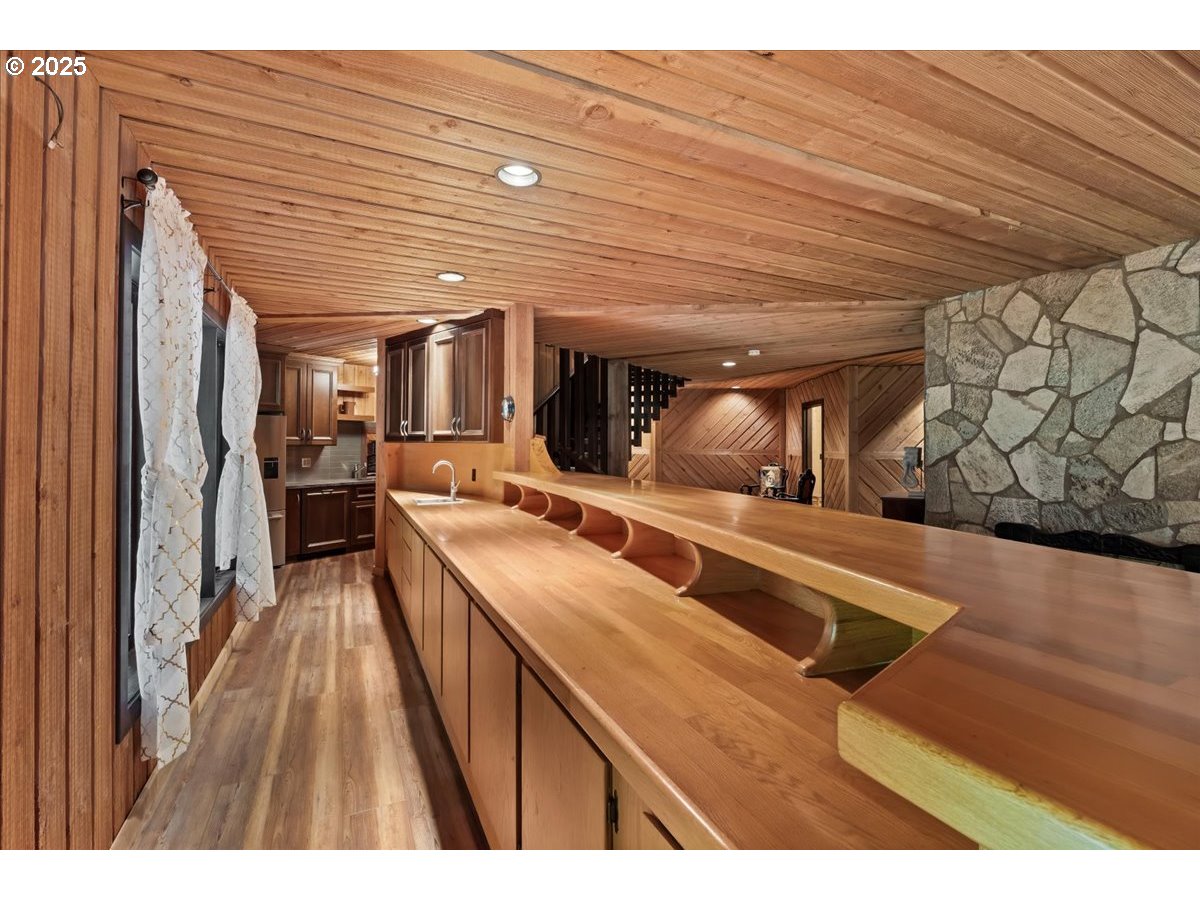 51720 Northwest Hayward Road Manning, OR 97125 - Photo 29 of 48 a view of a kitchen with wooden floor