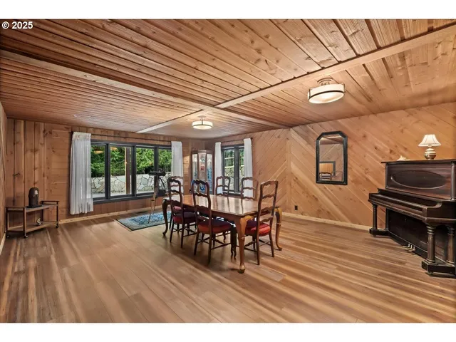 a open kitchen with a sink and wooden cabinets