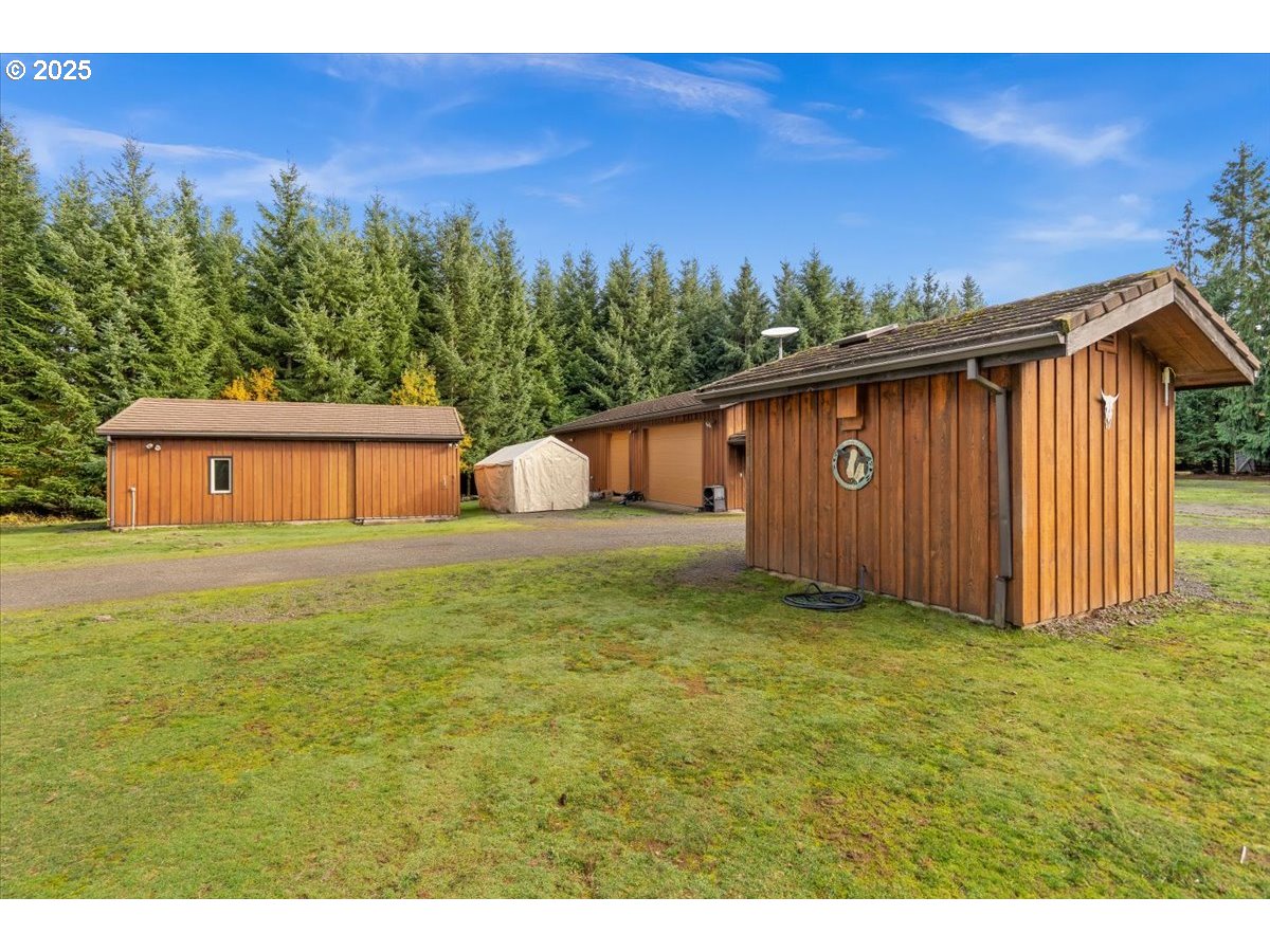 51720 Northwest Hayward Road Manning, OR 97125 - Photo 40 of 48 a front view of a house with a yard