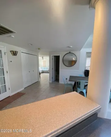 a kitchen with a stove and a refrigerator