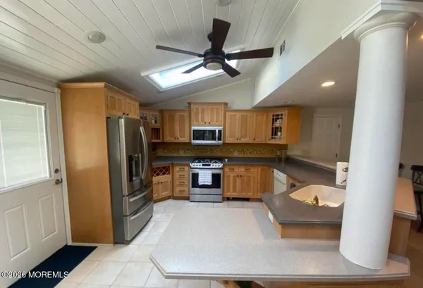 a view of furniture in wooden floor