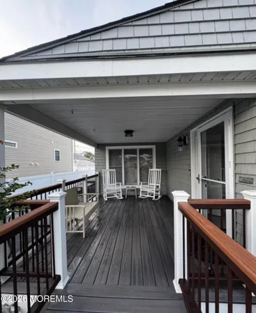 a kitchen with stainless steel appliances kitchen island granite countertop a stove a sink a table and chairs