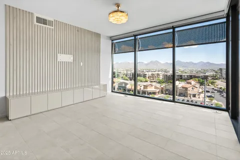 a kitchen with a sink and a refrigerator
