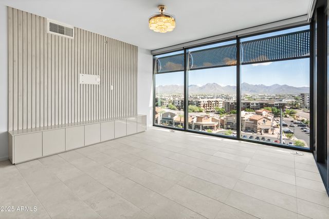 a kitchen with a sink and a refrigerator