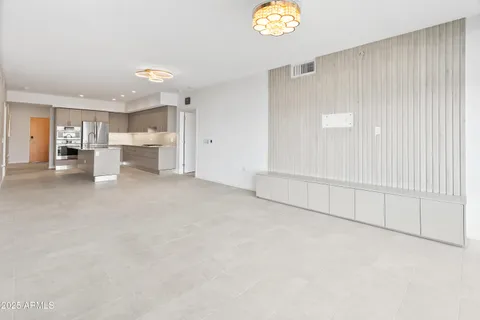 a view of an empty room with a sliding door