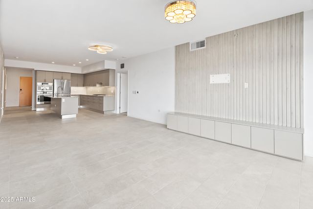 a view of an empty room with a sliding door