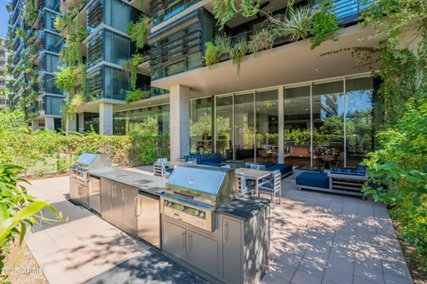 a swimming pool with outdoor seating and yard