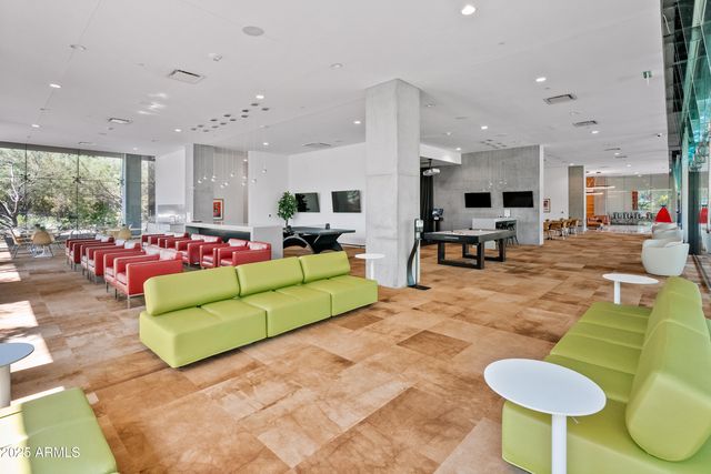 a view of open kitchen with seating area