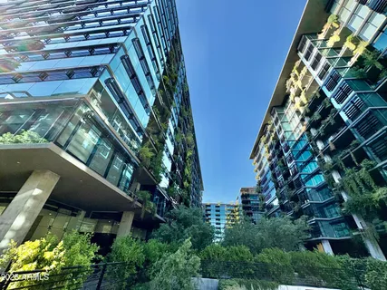 a view of a chairs and table in a patio