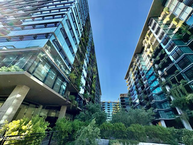 a view of a chairs and table in a patio