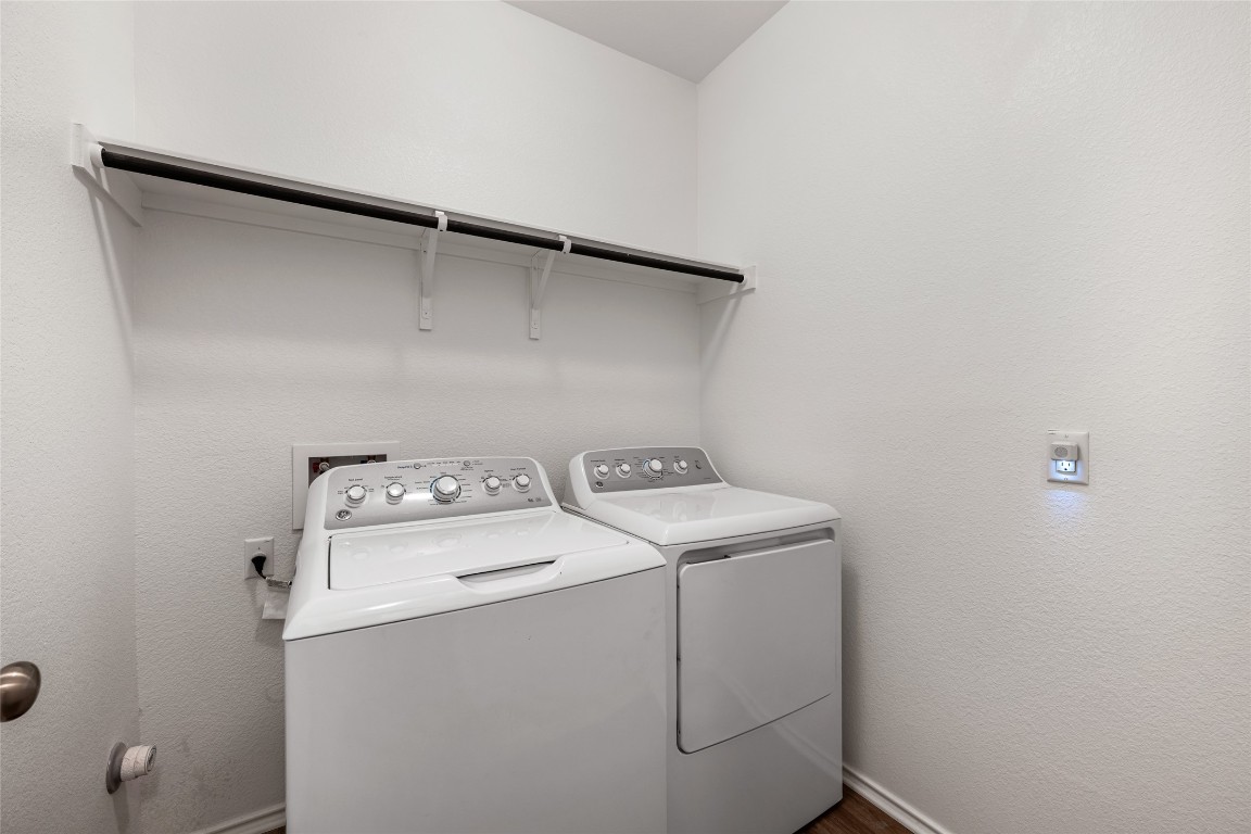 132 Joe Kidd Lane, Unit 132 Jarrell, TX 76537 - Photo 25 of 40 a utility room with dryer and washer