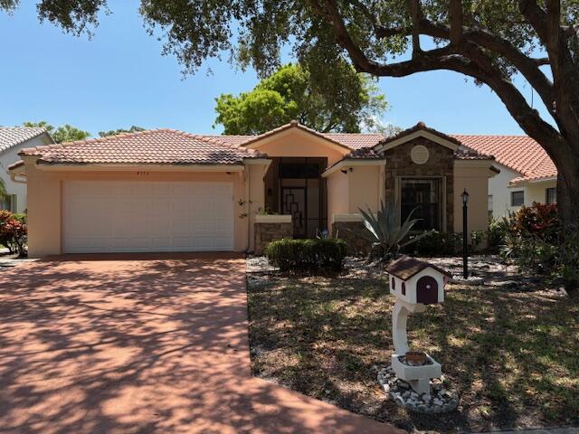 4772 Navigator Lane Boynton Beach, FL 33436 - Photo 1 of 44 a view of a house with yard and sitting area