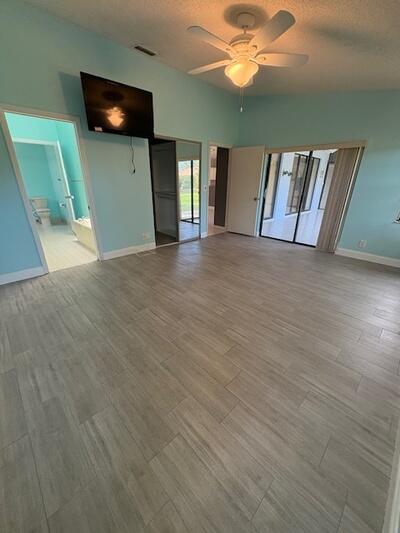 4772 Navigator Lane Boynton Beach, FL 33436 - Photo 24 of 44 a view of a livingroom with a staircase