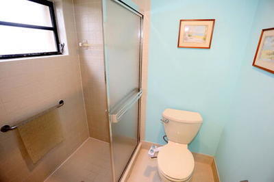 4772 Navigator Lane Boynton Beach, FL 33436 - Photo 30 of 44 a white toilet sitting next to a bathroom sink
