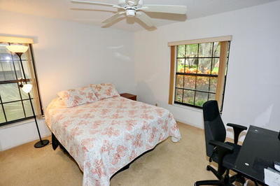 4772 Navigator Lane Boynton Beach, FL 33436 - Photo 32 of 44 a bedroom with a bed and a window