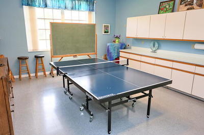 4772 Navigator Lane Boynton Beach, FL 33436 - Photo 43 of 44 a room with table chairs and windows