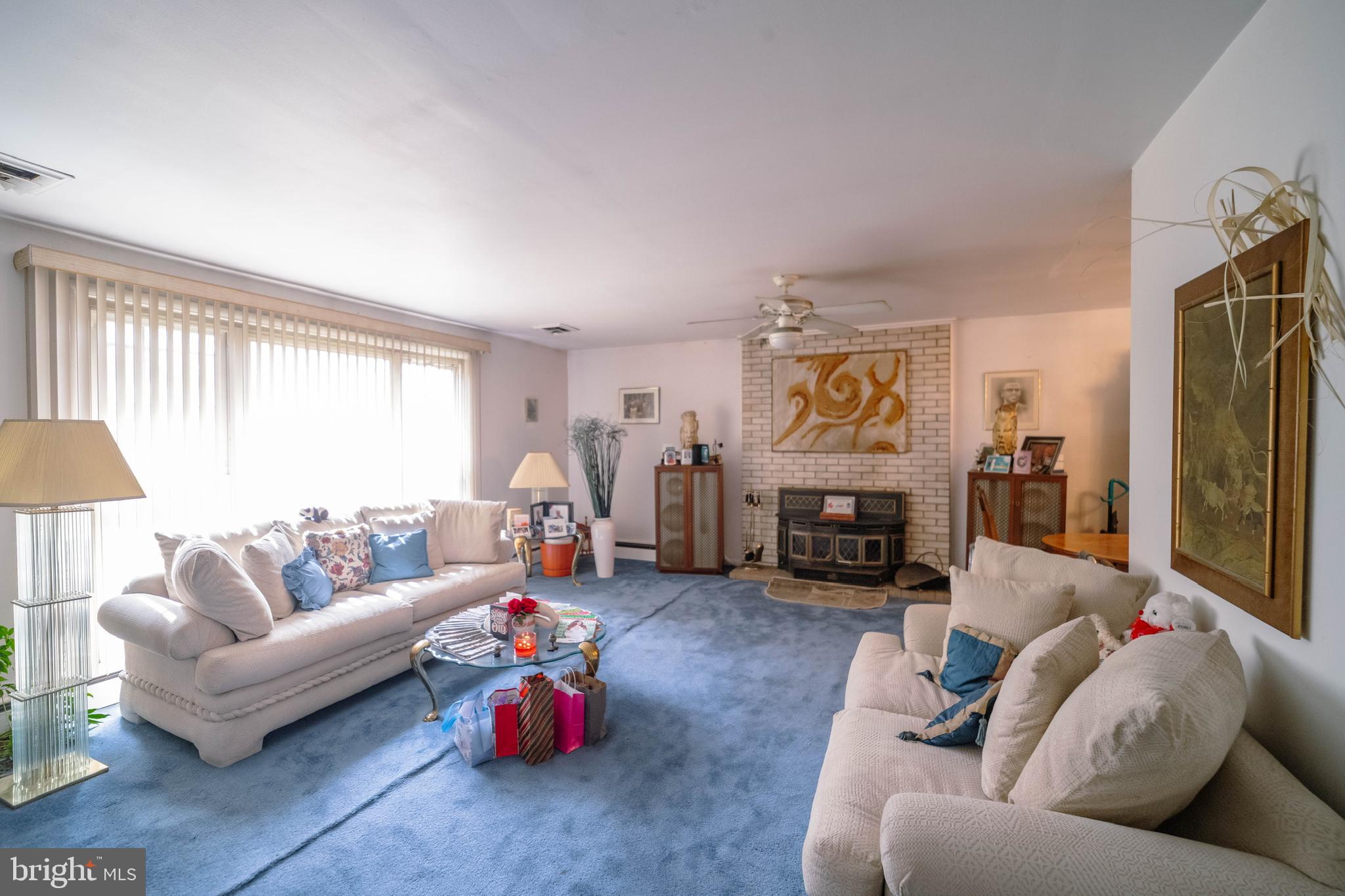 6900 Temple Hill Road Temple Hills, MD 20748 - Photo 40 of 43 a living room with furniture and a fireplace