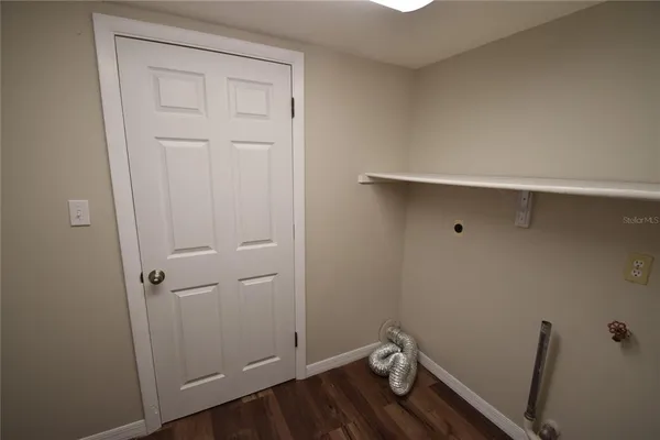 a view of kitchen and utility room