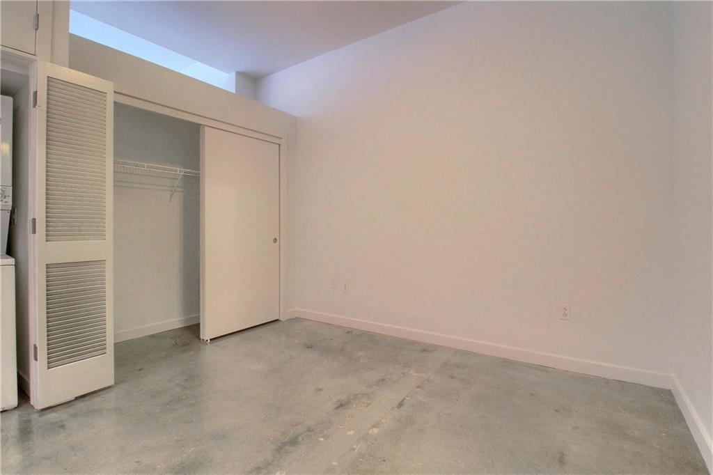 507 Sabine Street, Unit 602 Austin, TX 78701 - Photo 11 of 22 an empty room with an empty space