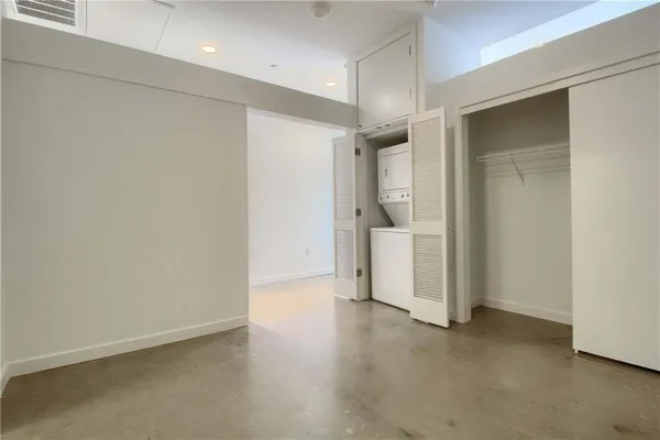 an empty room with a bathroom