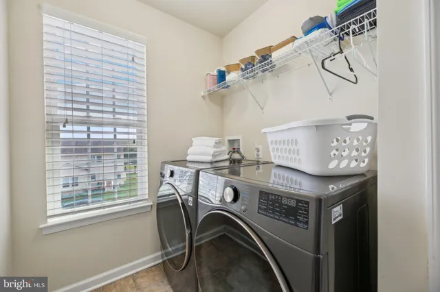 a large bathroom with a large tub and sink
