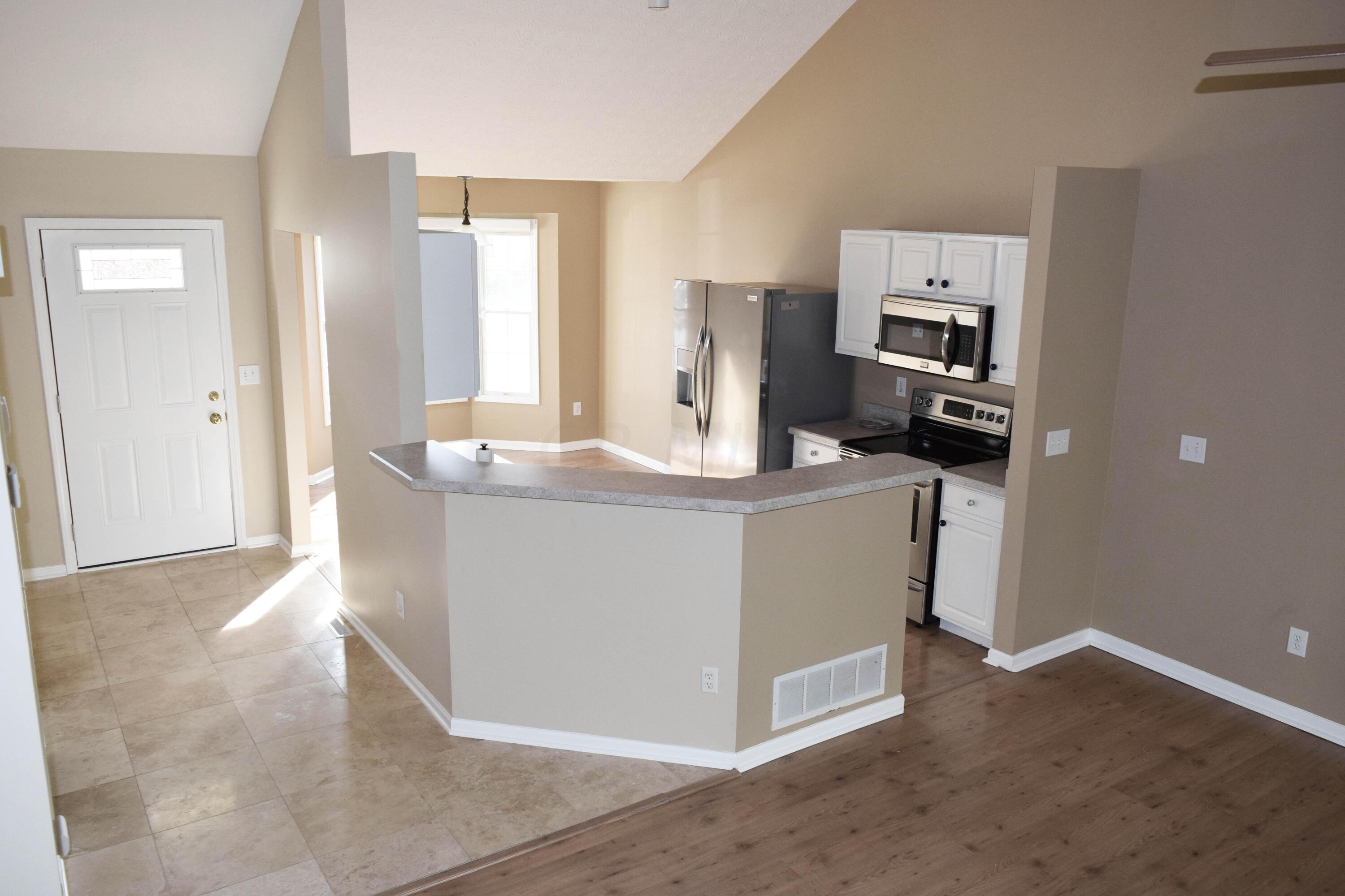 312 Holly Grove Road Lewis Center, OH 43035 - Photo 2 of 32 02-Entry & Kitchen