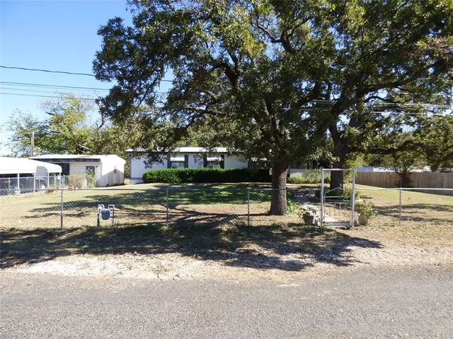 a view of dinning table and chairs in the patio