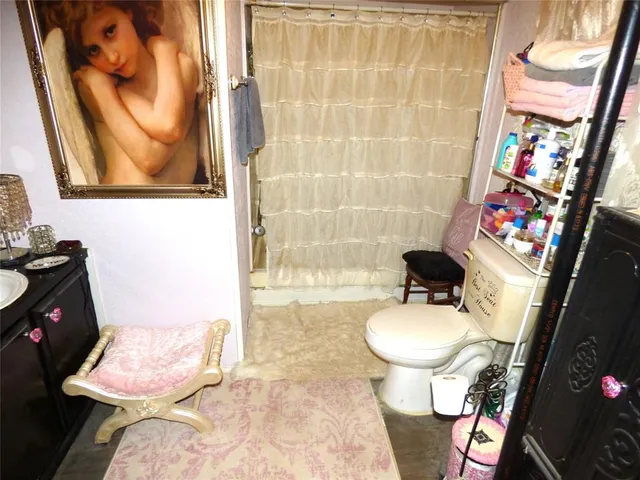 a bathroom with a sink and a toilet