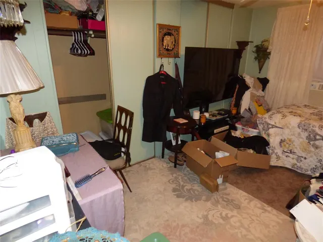 a room with furniture and a window