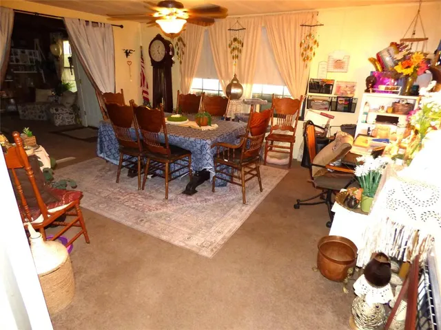 a kitchen with a sink a stove and a window