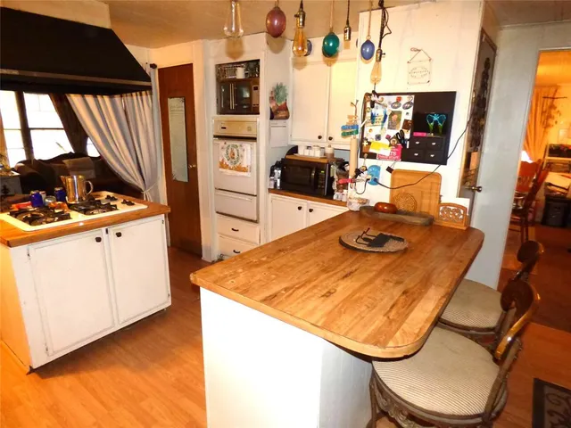 a bed room with a bed and a table in it