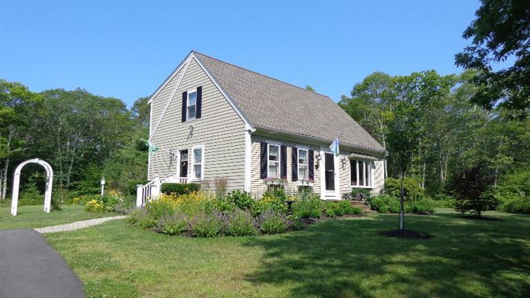 5 Cotuit Road Sandwich, MA 02563 - Photo 1 of 34 a front view of a house with a yard
