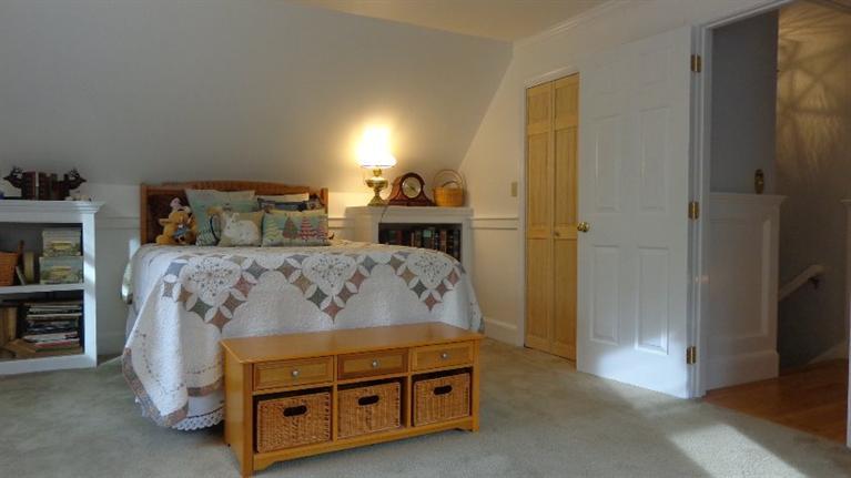 5 Cotuit Road Sandwich, MA 02563 - Photo 18 of 34 a bed room with a bed and a night stand
