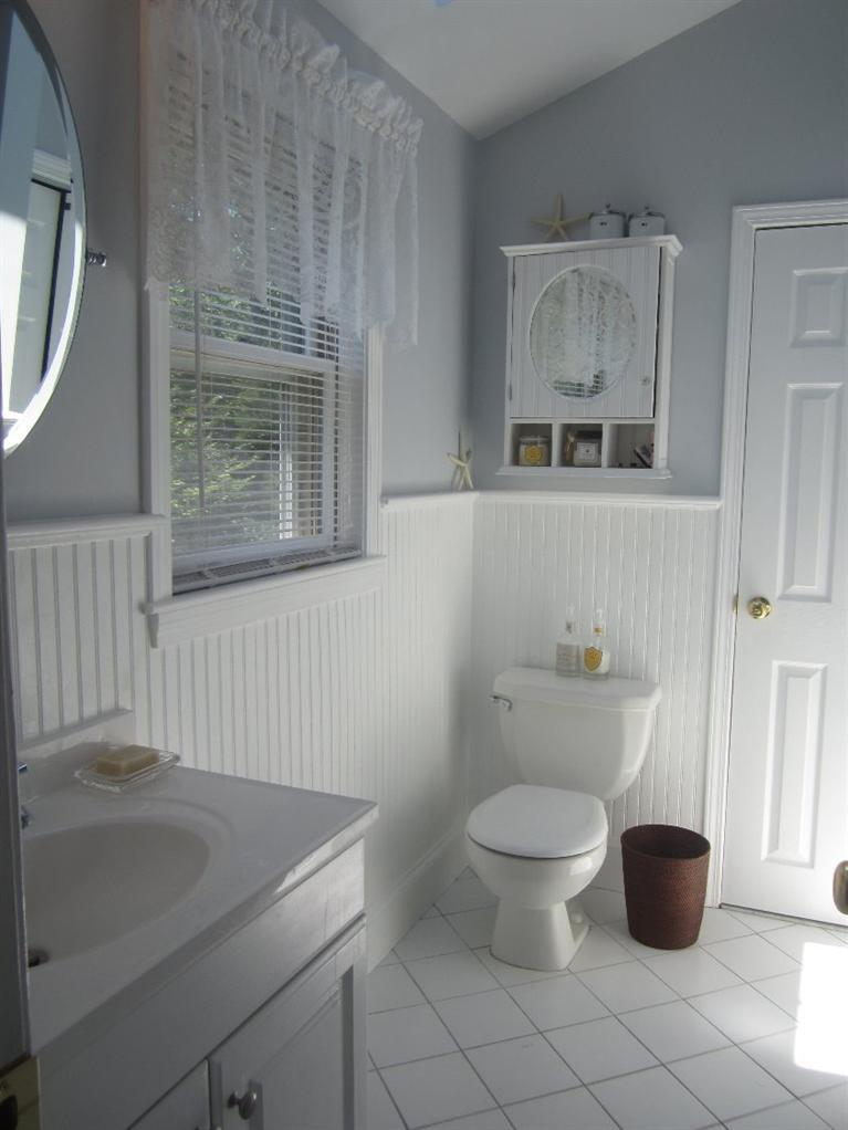 5 Cotuit Road Sandwich, MA 02563 - Photo 20 of 34 a bathroom with a toilet sink and mirror