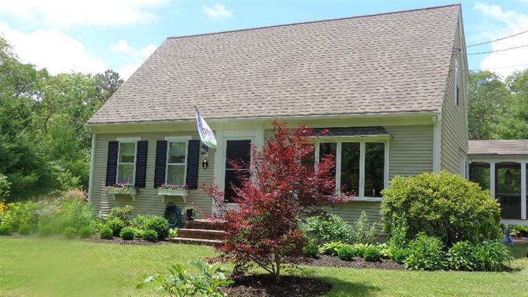5 Cotuit Road Sandwich, MA 02563 - Photo 3 of 34 front view of a house with a yard