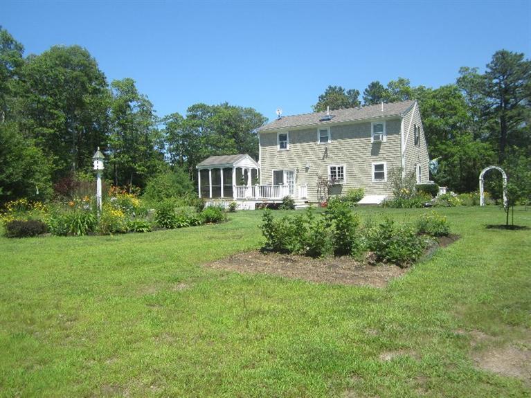 5 Cotuit Road Sandwich, MA 02563 - Photo 34 of 34 a view of a house with a backyard